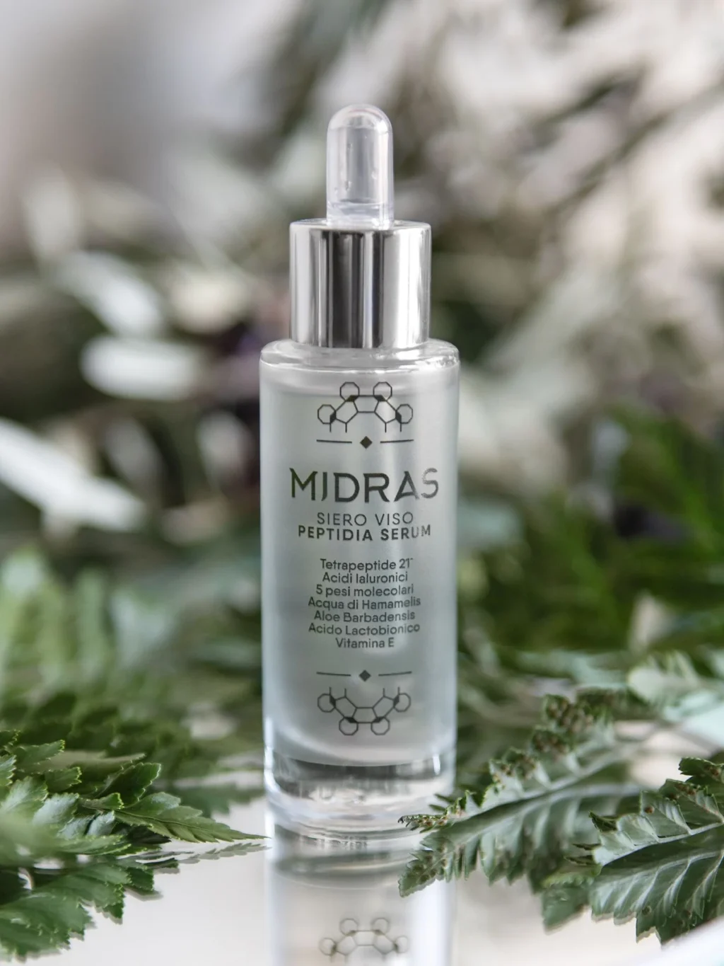 Flacone in vetro con contagocce del siero viso Midras Peptidia Serum a base di Tetrapeptide-21 e 5 acidi ialuronici